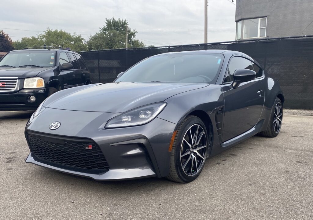 Close-up of Paint Protection Film installation on a Detroit vehicle.